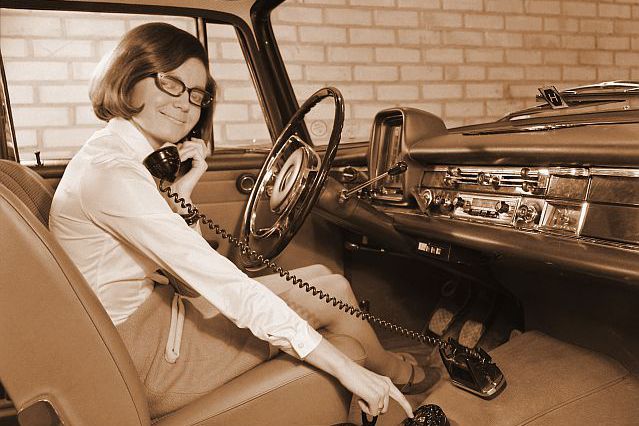 Photo of 1969 car phone user courtesy Ericsson.